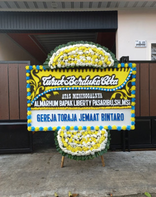 Papan Bunga Duka di Hubikosi